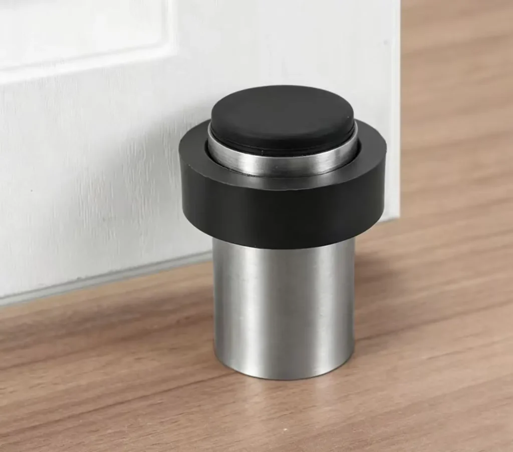 Floor mounted rubber door stop installation